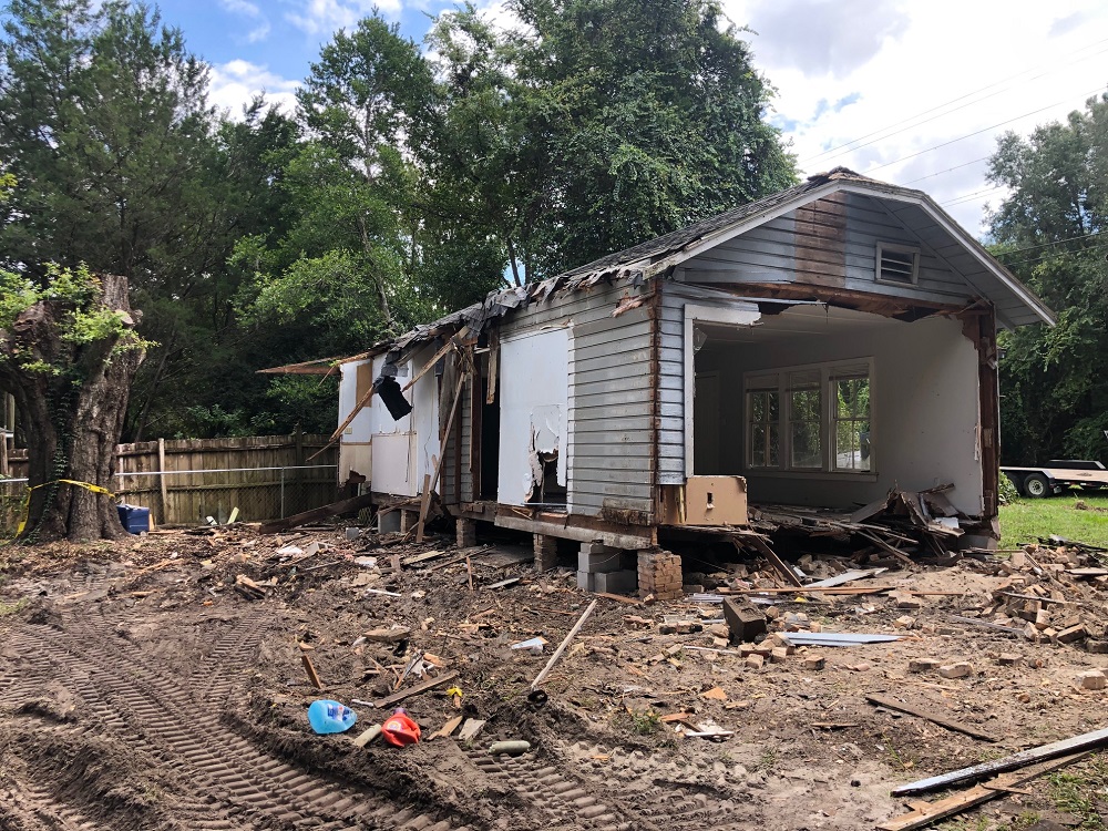 Demolition in progress on house